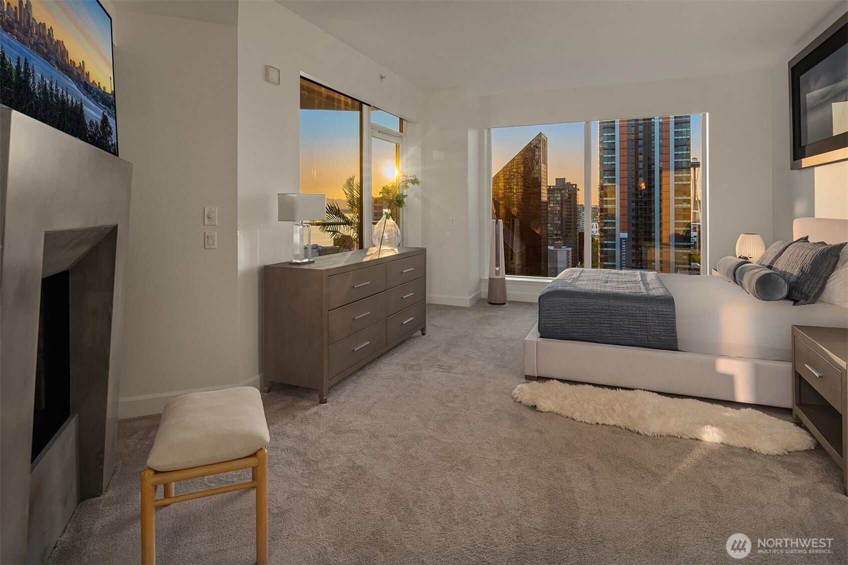 1920 4th Avenue, Unit 2202 Seattle, WA 98101 - Photo 20 of 35 a living room with furniture and a flat screen tv