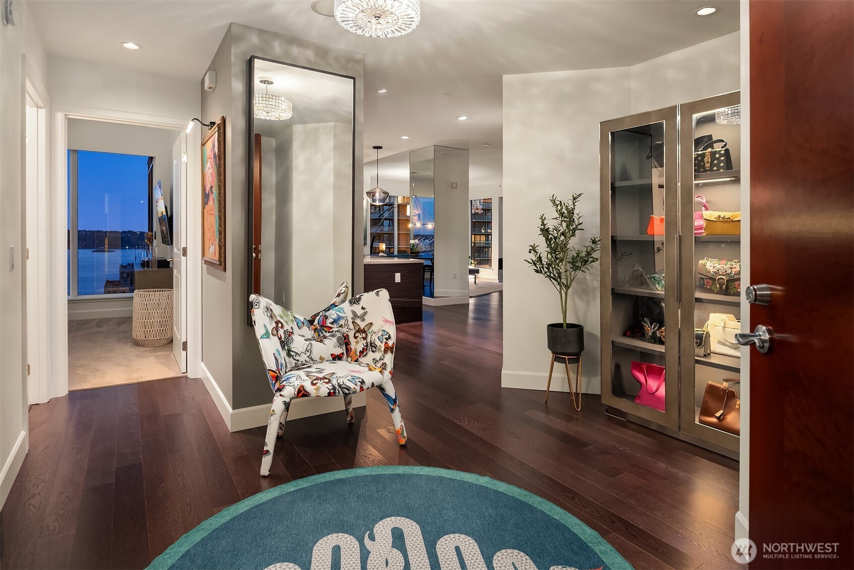 1920 4th Avenue, Unit 2202 Seattle, WA 98101 - Photo 25 of 35 a living room with furniture and wooden floor