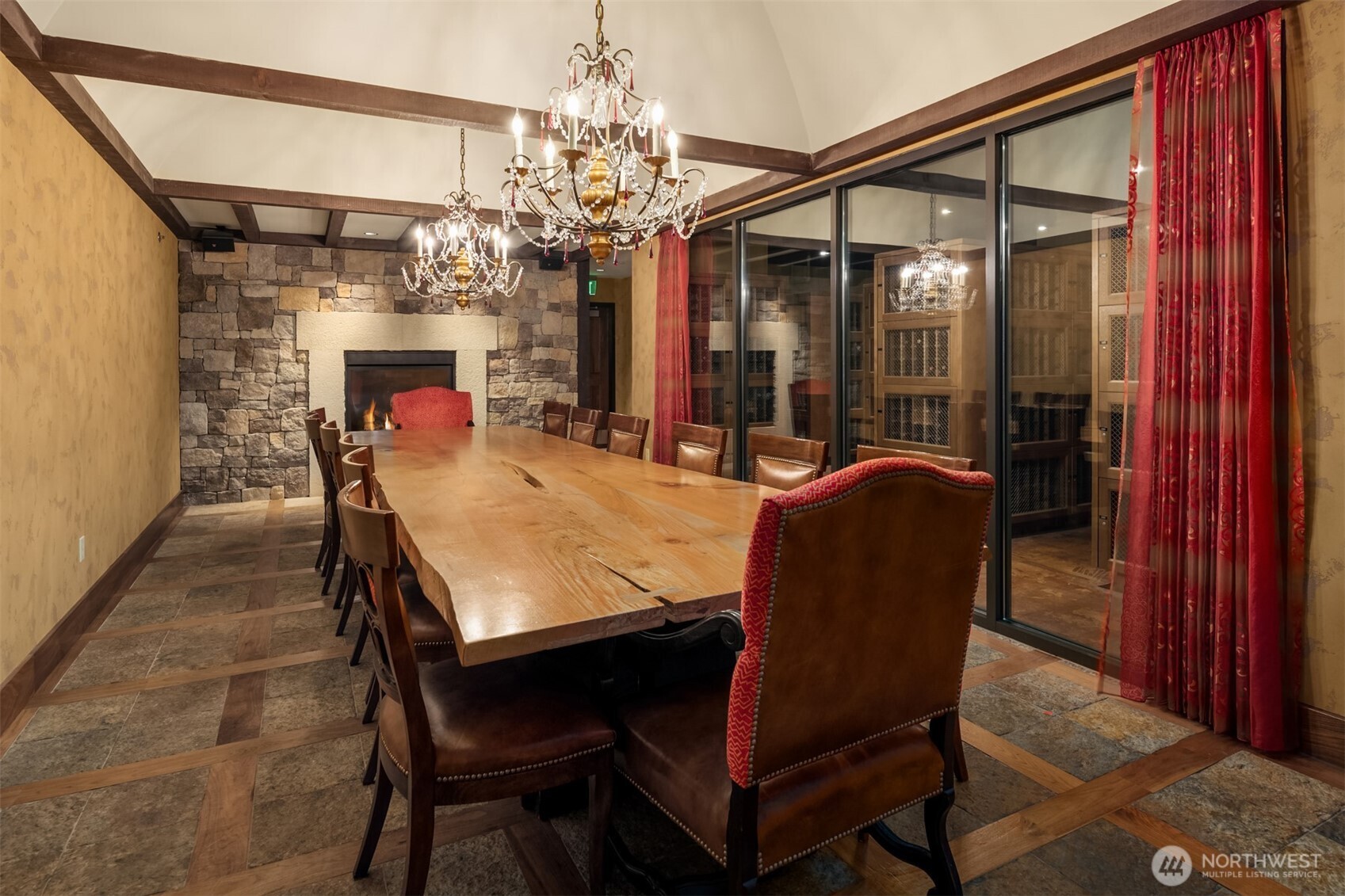 1920 4th Avenue, Unit 2202 Seattle, WA 98101 - Photo 33 of 35 a view of a dining room with furniture and a chandelier