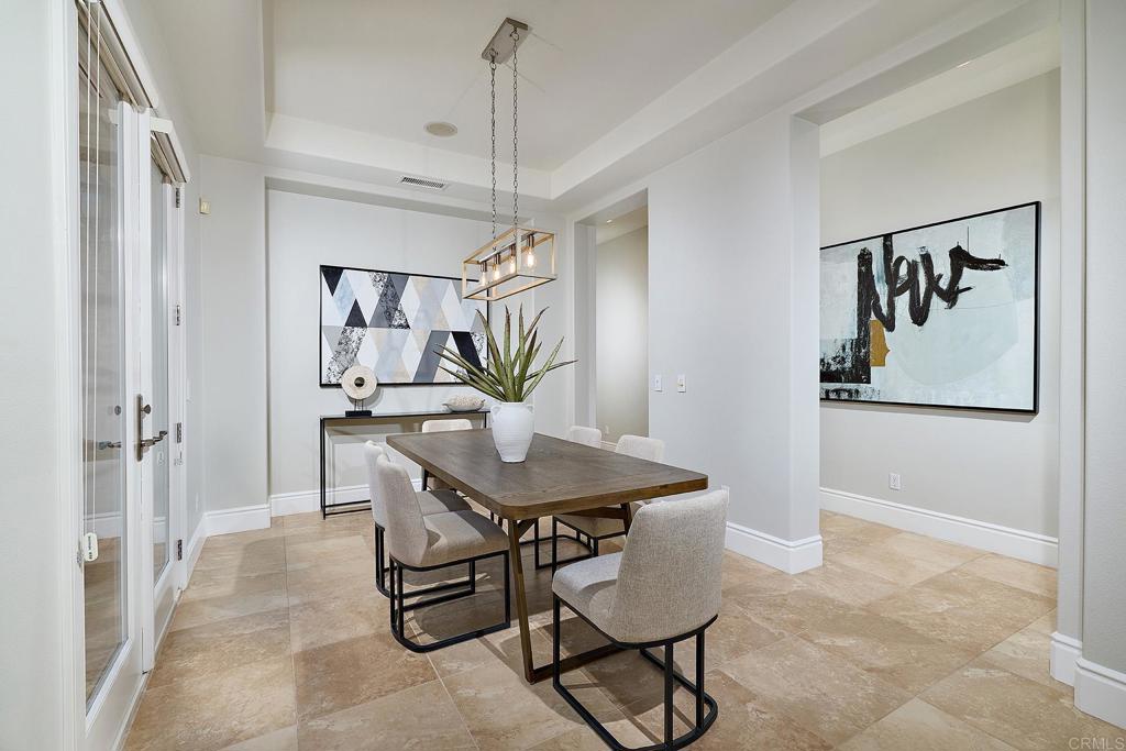 3230 Corte Aliso Carlsbad, CA 92009 - Photo 5 of 23 a view of a dining room with furniture