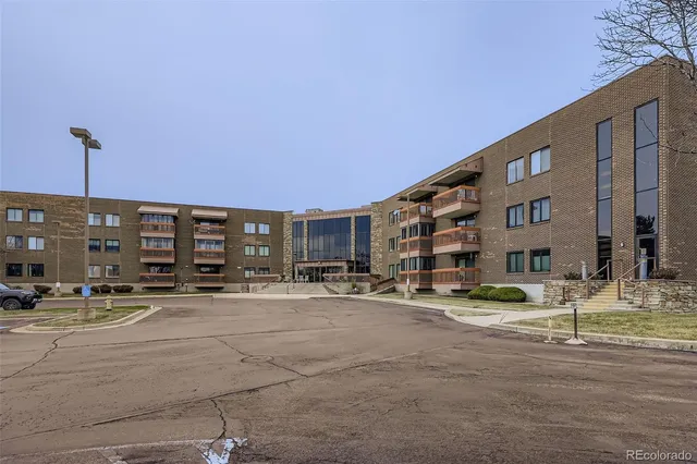 a front view of a building with street view
