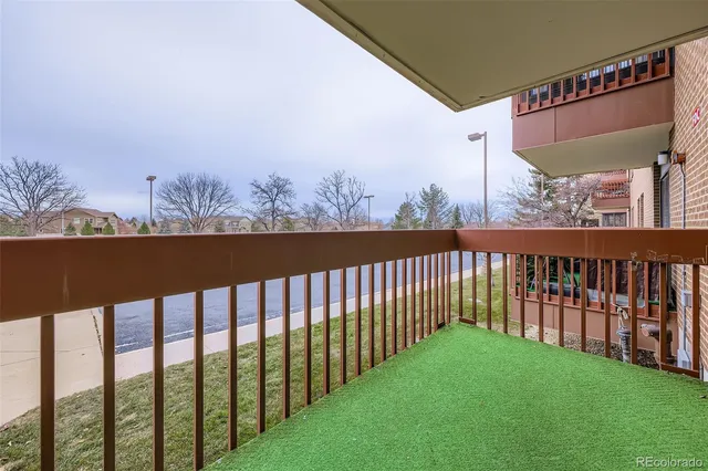 a view of a porch with a yard