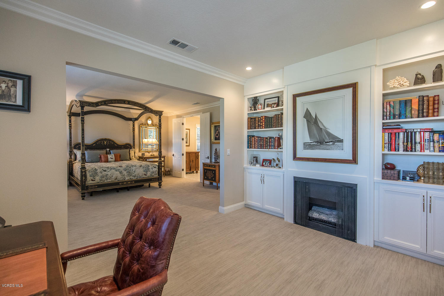 38 Inverness Road Thousand Oaks, CA 91361 - Photo 17 of 35 a bedroom with furniture and a fireplace