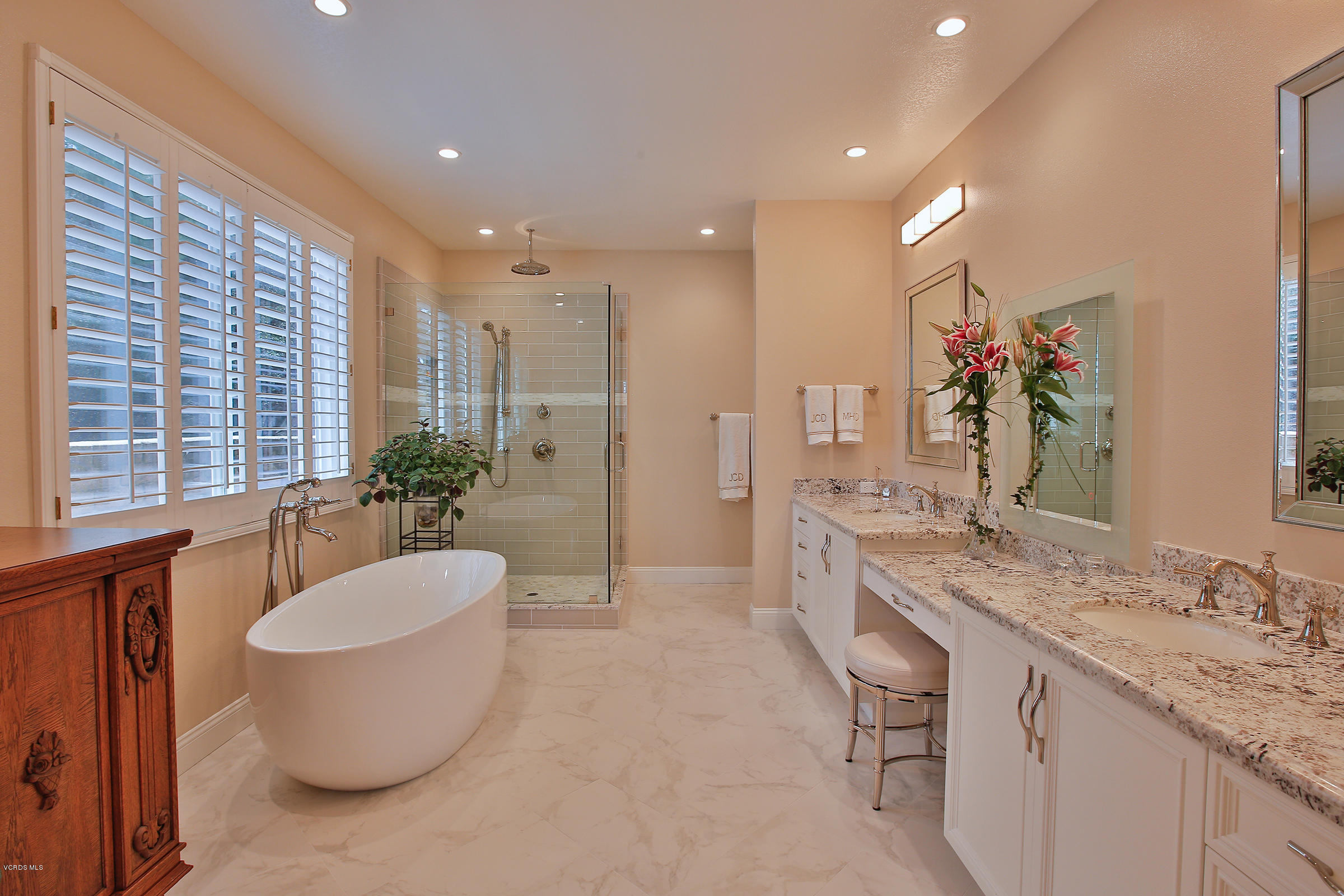 38 Inverness Road Thousand Oaks, CA 91361 - Photo 19 of 35 a bathroom with a granite countertop sink and a mirror