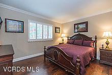 38 Inverness Road Thousand Oaks, CA 91361 - Photo 21 of 35 a bedroom with a bed and wooden floor