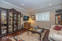 38 Inverness Road Thousand Oaks, CA 91361 - Photo 22 of 35 a living room with furniture a lamp and a window