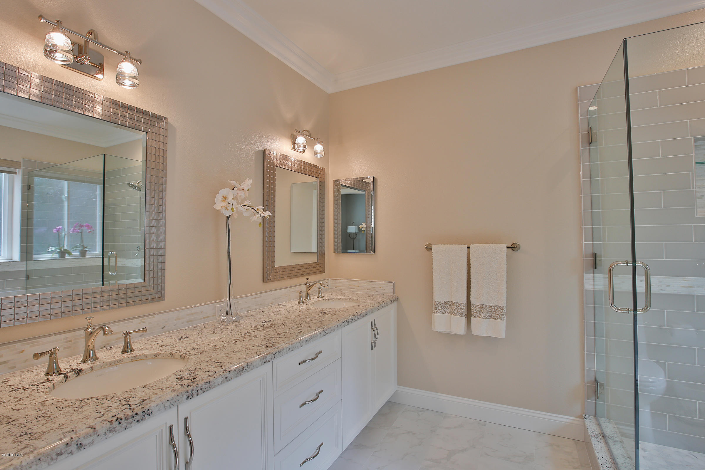 38 Inverness Road Thousand Oaks, CA 91361 - Photo 23 of 35 a bathroom with a granite countertop double vanity sink and a mirror