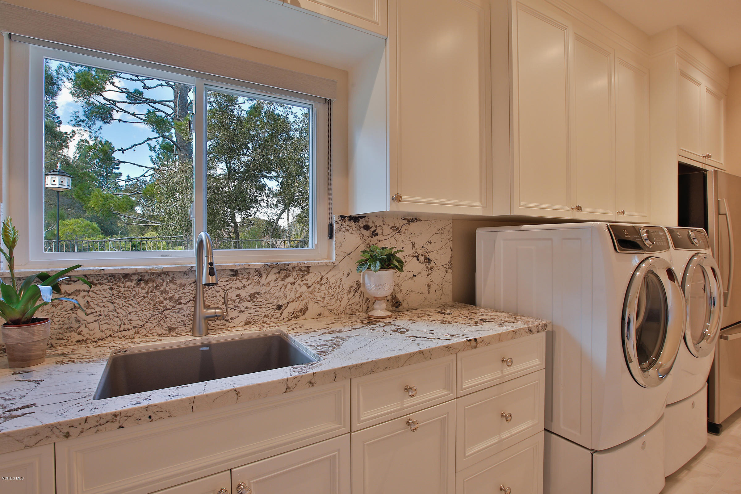 38 Inverness Road Thousand Oaks, CA 91361 - Photo 25 of 35 a kitchen with a sink and a cabinets