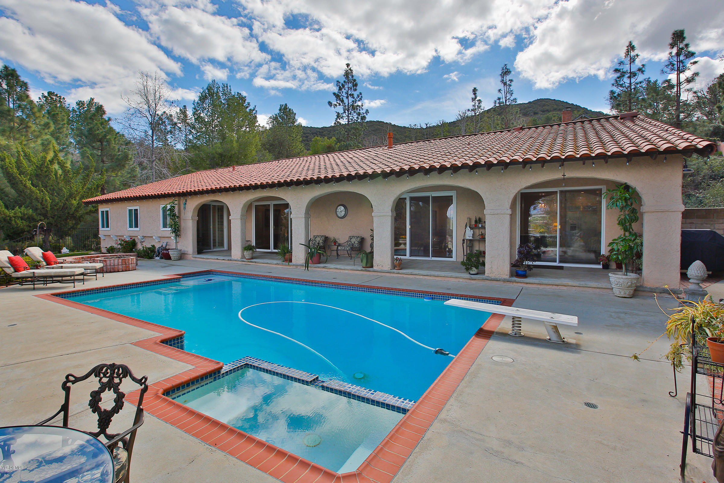38 Inverness Road Thousand Oaks, CA 91361 - Photo 29 of 35 a front view of house with swimming pool yard and outdoor seating