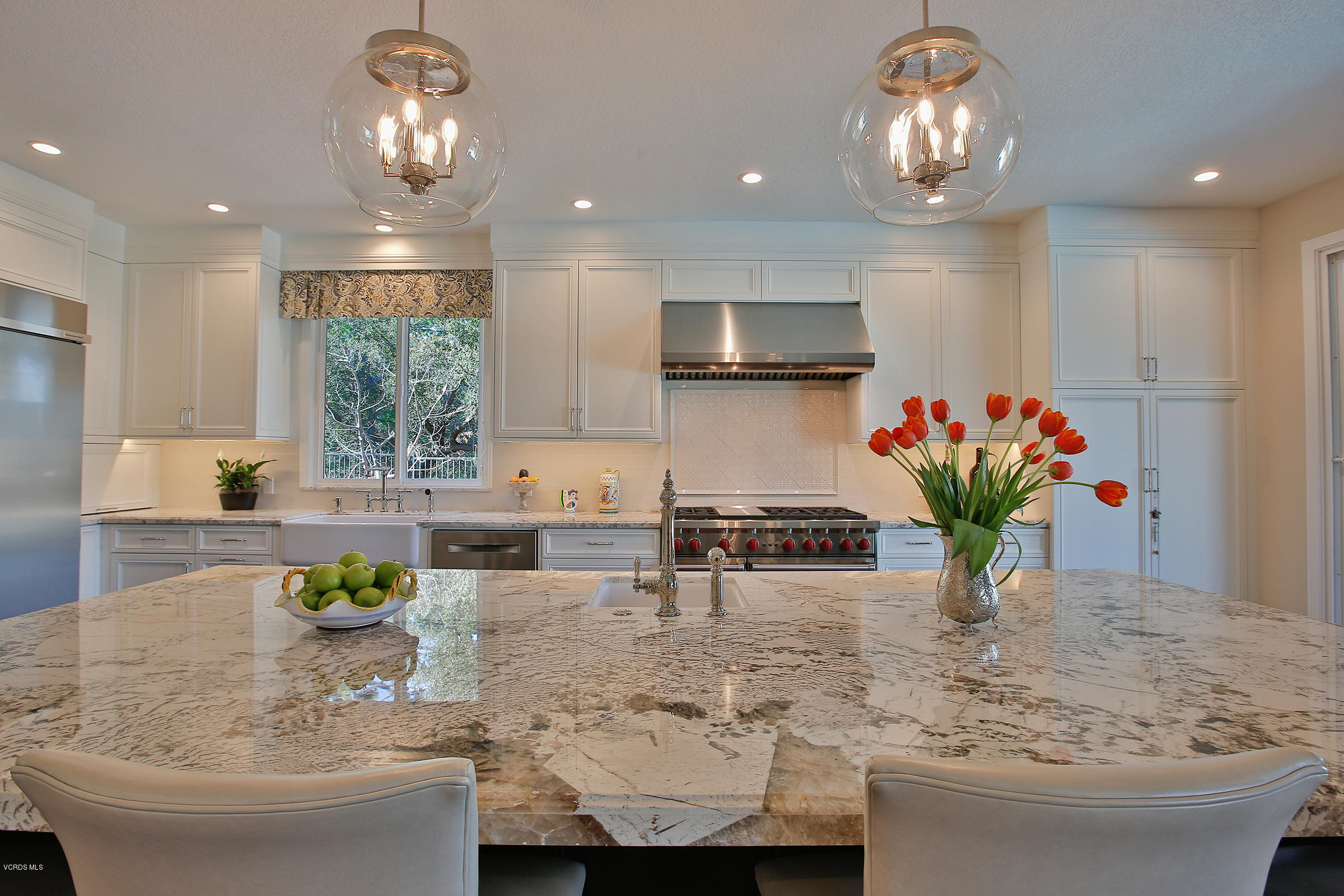 38 Inverness Road Thousand Oaks, CA 91361 - Photo 4 of 35 a kitchen with stainless steel appliances granite countertop a stove a sink and a white cabinets