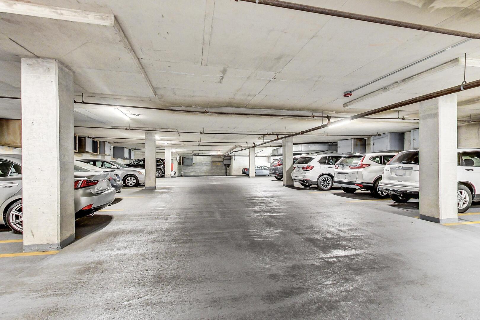 6 South Laflin Street, Unit 923 Chicago, IL 60607 - Photo 21 of 24 a view of cars parked in a parking