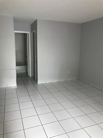 a view of a livingroom and entryway