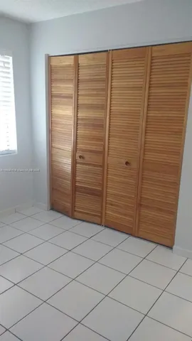 an empty room with closet
