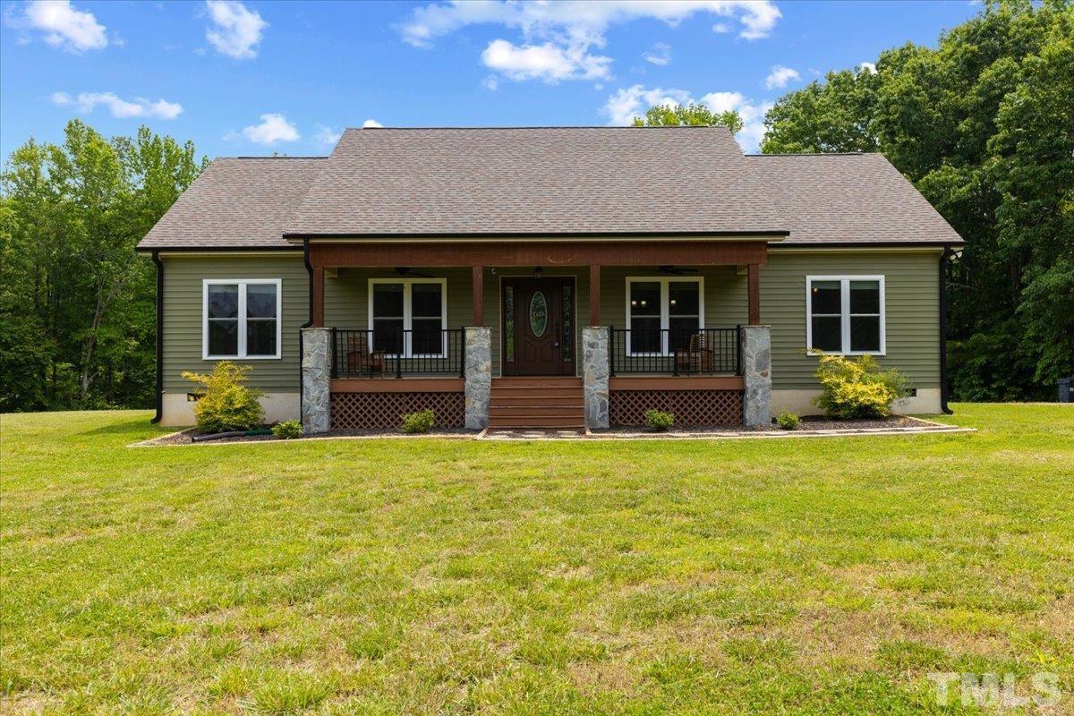 11208 Range Road Rougemont, NC 27572 - Photo 1 of 40 a front view of a house with dining space