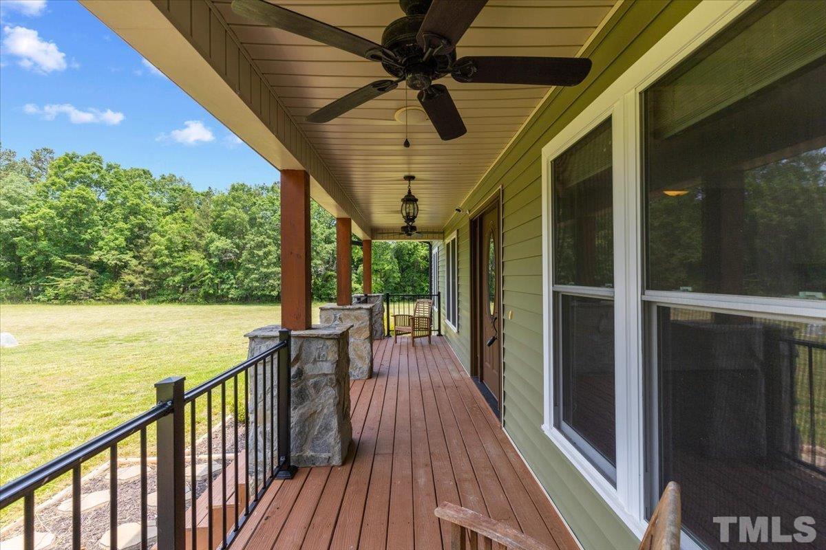 11208 Range Road Rougemont, NC 27572 - Photo 2 of 40 a view of a balcony with wooden floor