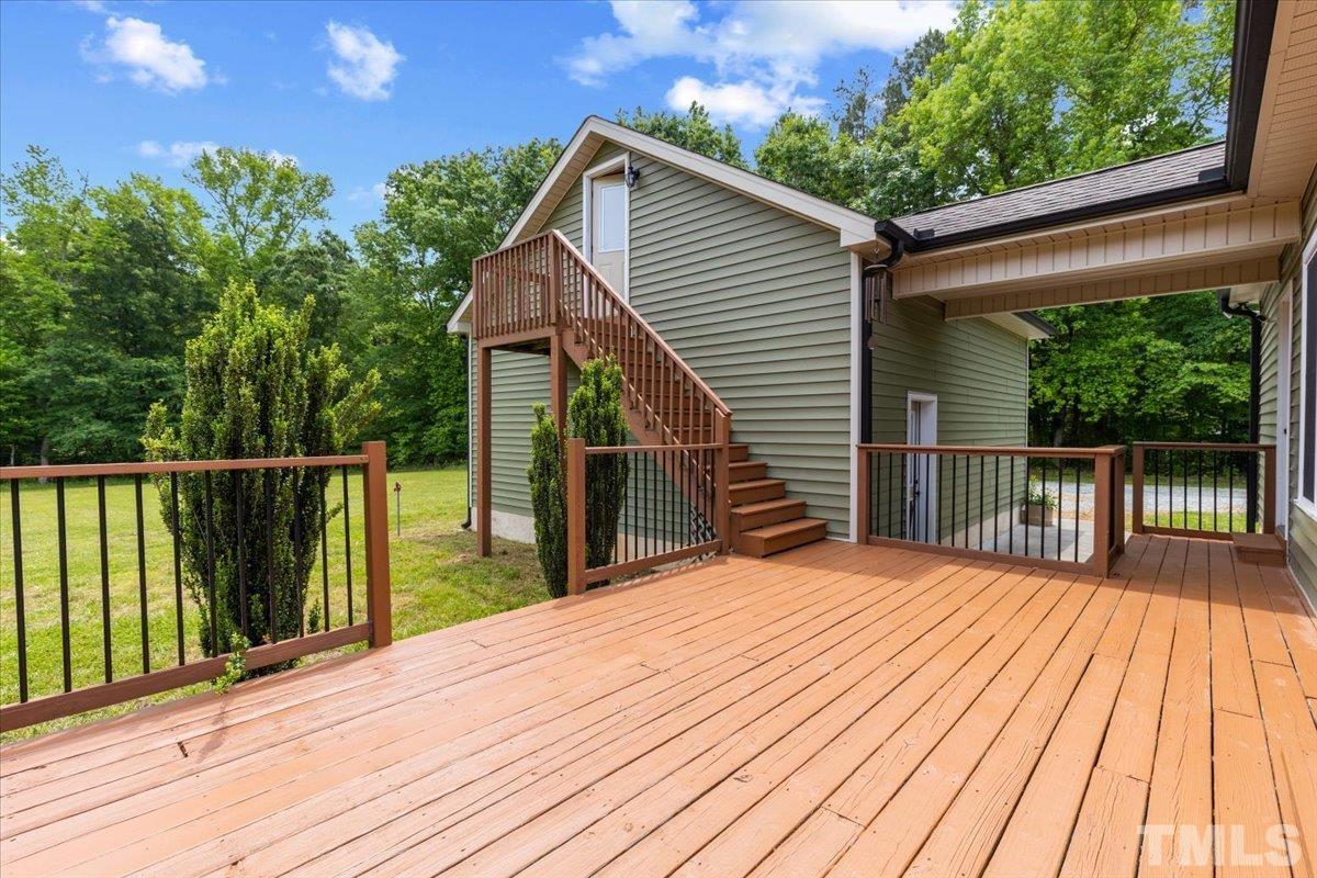 11208 Range Road Rougemont, NC 27572 - Photo 26 of 40 a balcony with wooden floor and fence