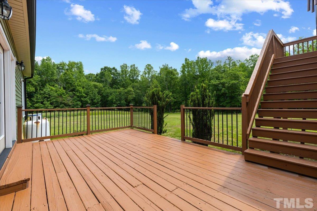 11208 Range Road Rougemont, NC 27572 - Photo 27 of 40 a view of a balcony with wooden floor