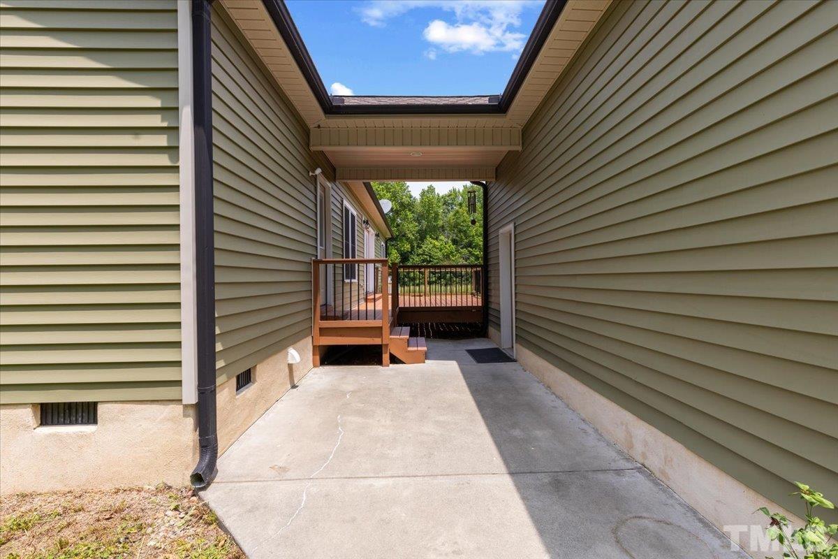 11208 Range Road Rougemont, NC 27572 - Photo 28 of 40 a backyard of a house with seating space