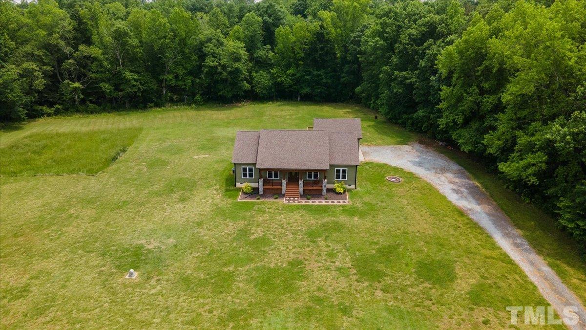 11208 Range Road Rougemont, NC 27572 - Photo 38 of 40 a view of a swimming pool with a backyard