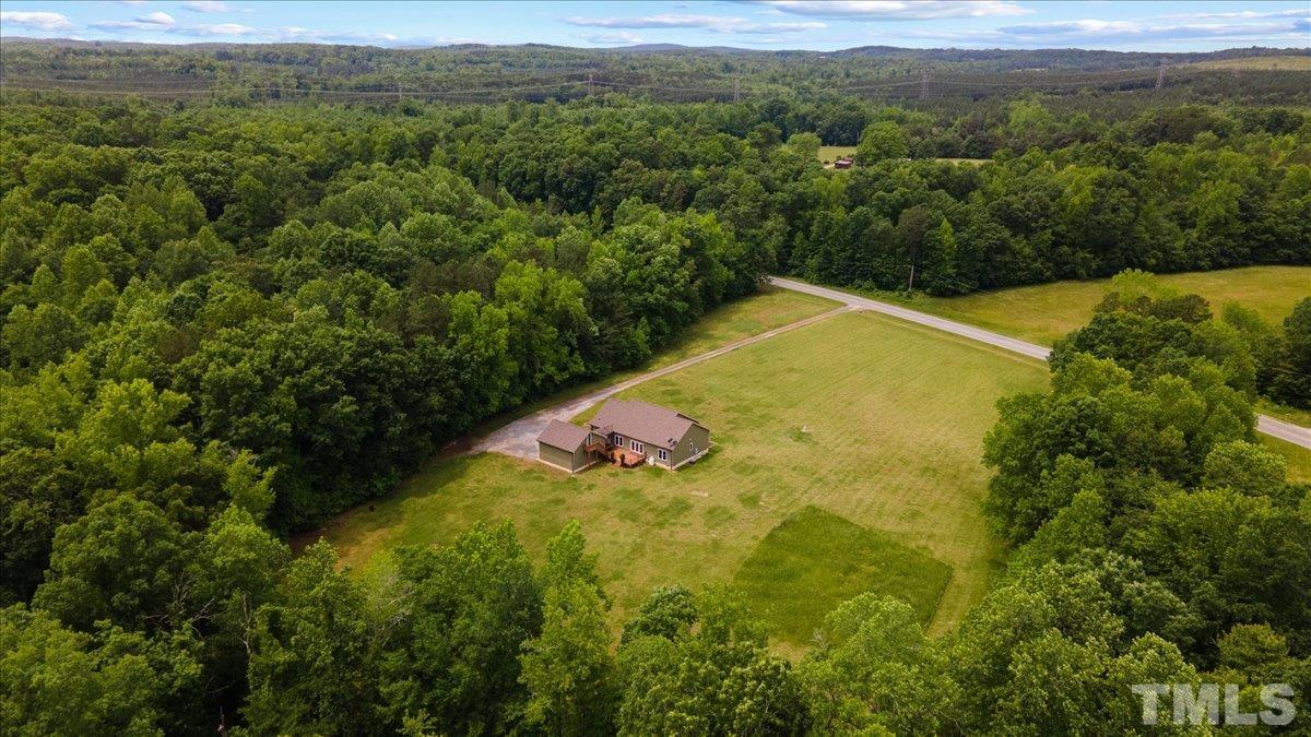 11208 Range Road Rougemont, NC 27572 - Photo 40 of 40 a view of a big yard with lots of green space