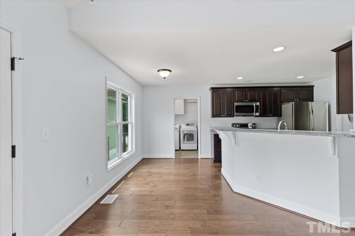 11208 Range Road Rougemont, NC 27572 - Photo 9 of 40 a view of a kitchen with a sink and microwave
