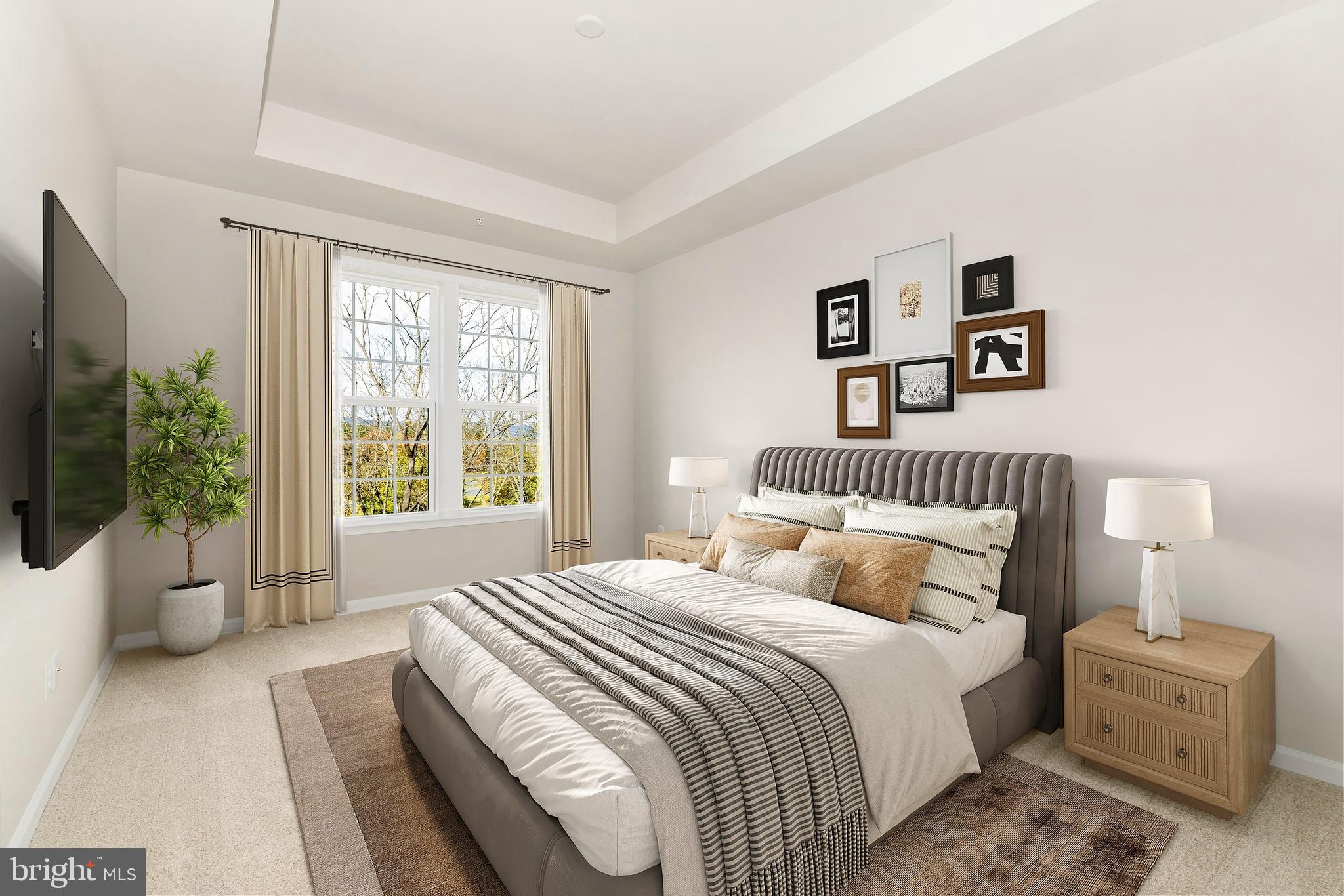 101 Spring Bank Way Frederick, MD 21701 - Photo 14 of 20 a bedroom with a large bed and a couch