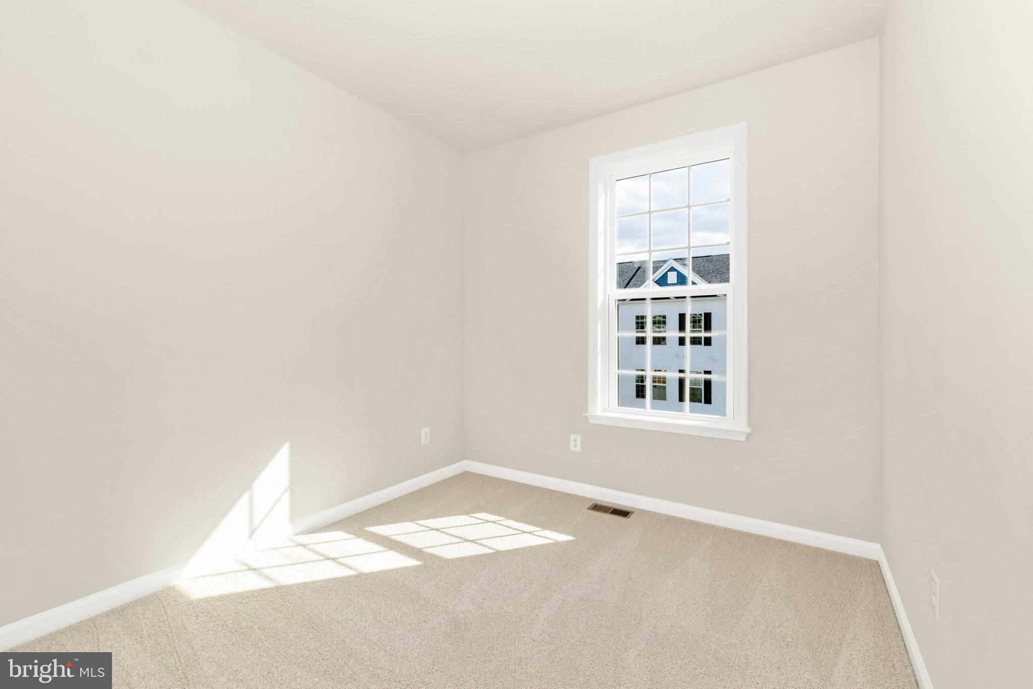 101 Spring Bank Way Frederick, MD 21701 - Photo 17 of 20 a view of a room with a window