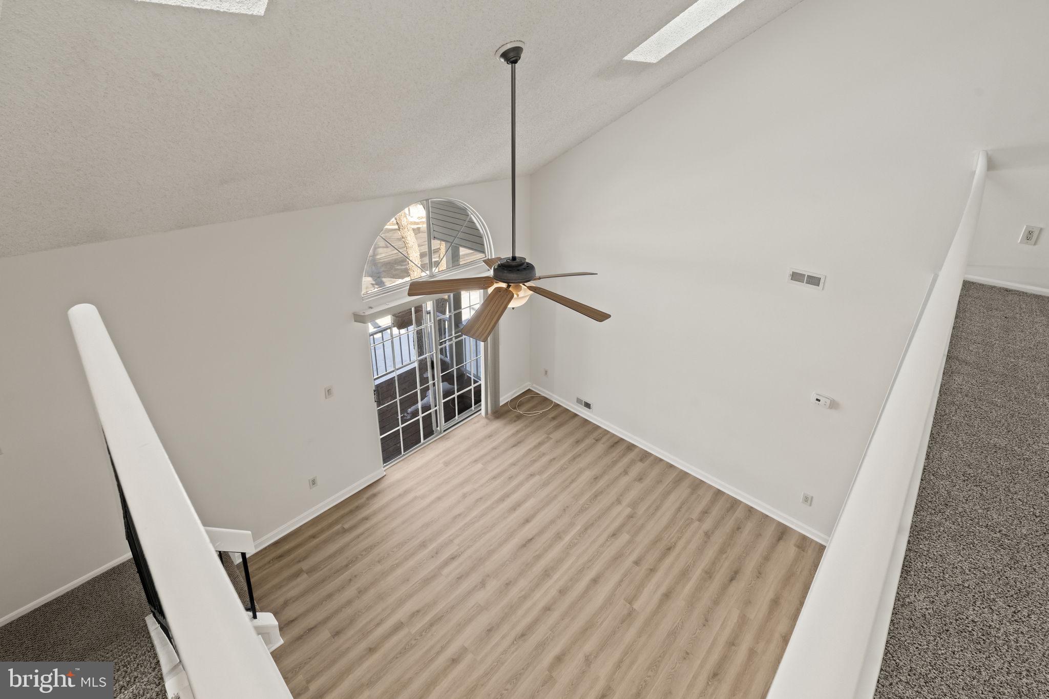 5508 B Albridge Way Mount Laurel, NJ 08054 - Photo 13 of 27 a view of a hallway with wooden floor