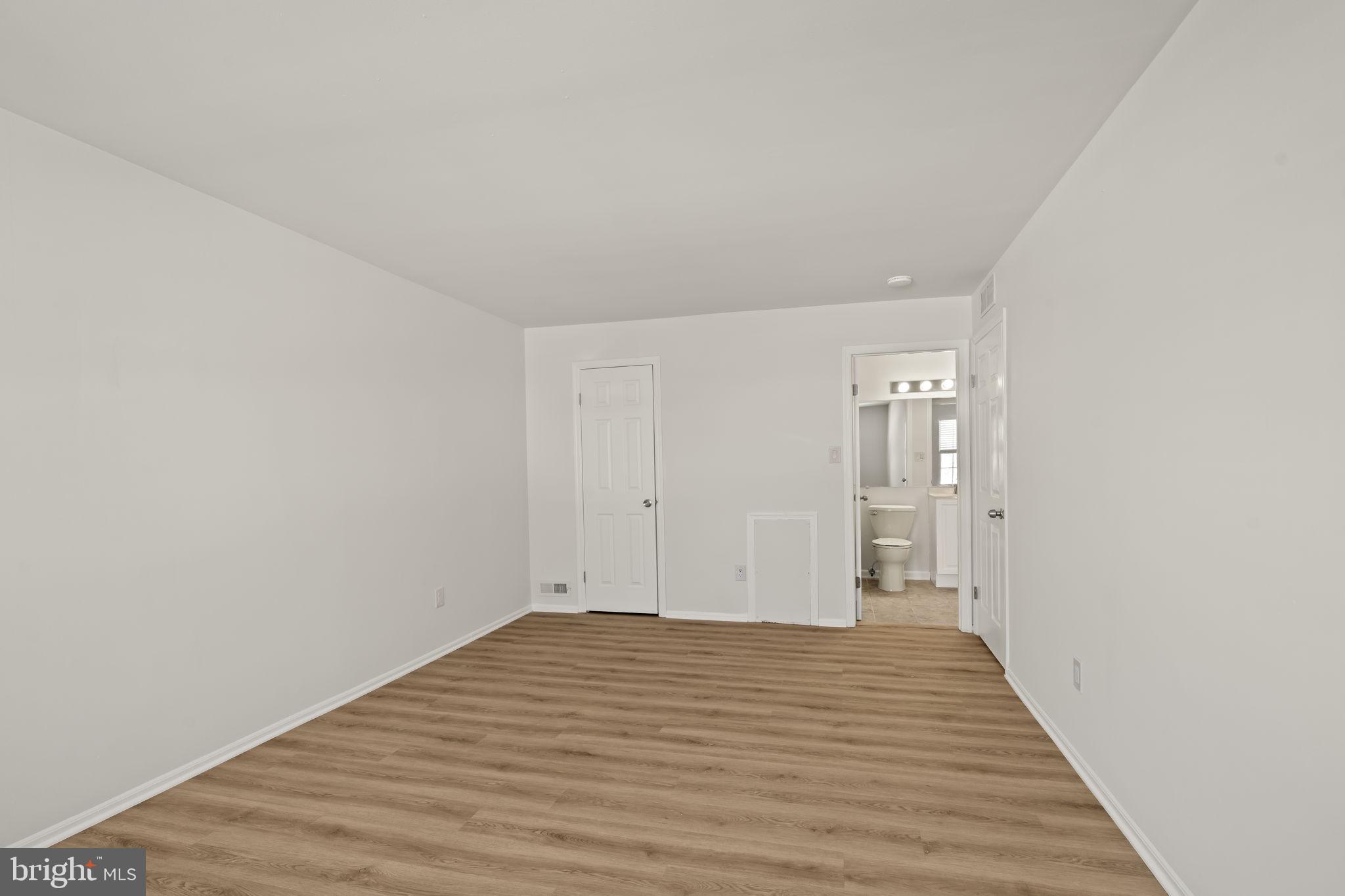 5508 B Albridge Way Mount Laurel, NJ 08054 - Photo 24 of 27 a view of a room with wooden floor