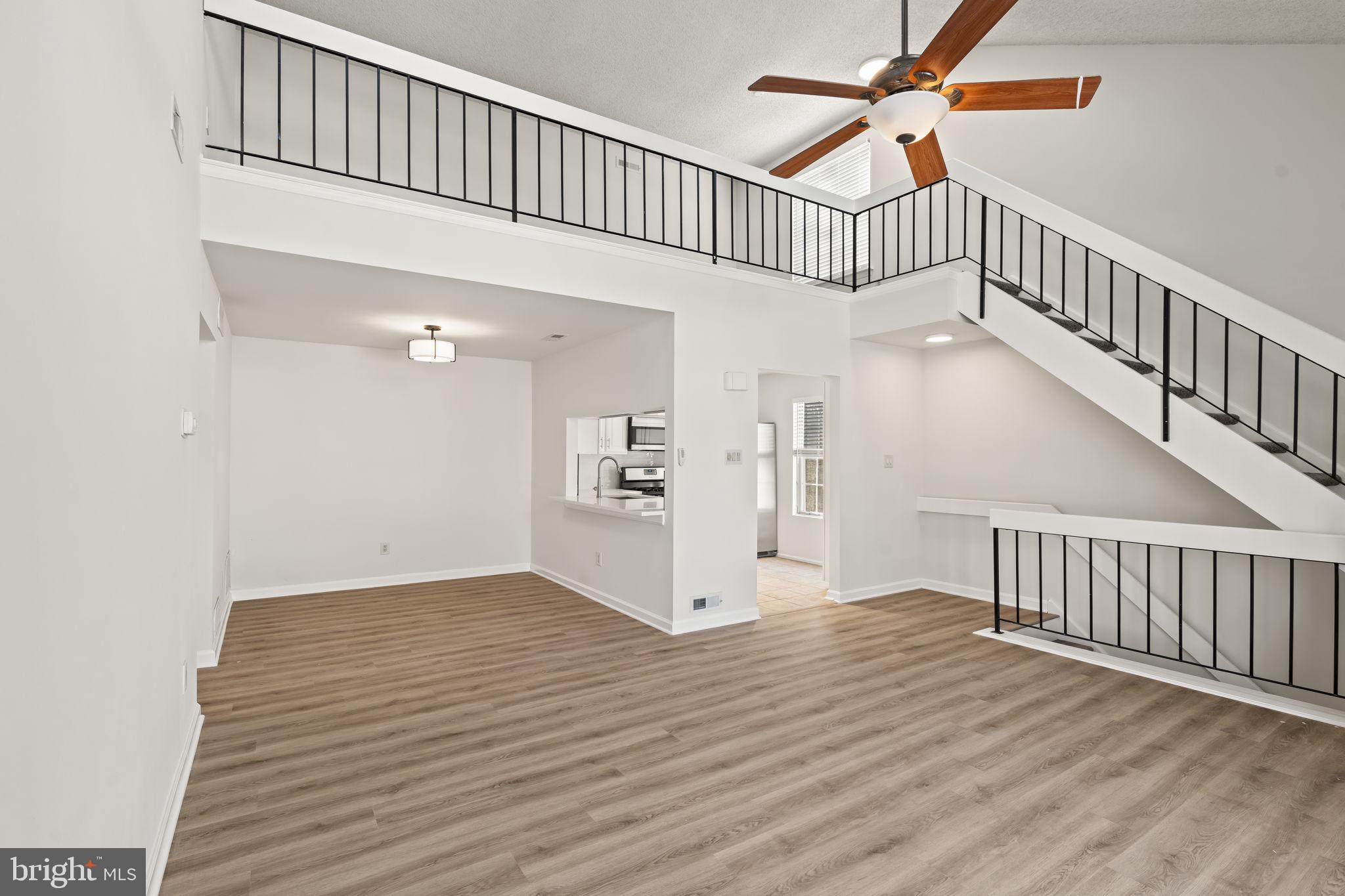 5508 B Albridge Way Mount Laurel, NJ 08054 - Photo 6 of 27 a view of a hallway with wooden floor