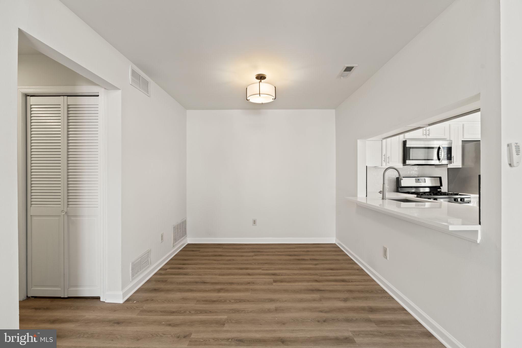5508 B Albridge Way Mount Laurel, NJ 08054 - Photo 7 of 27 a view of a kitchen cabinets and wooden floor