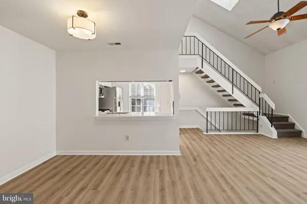 a view of entryway with wooden floor