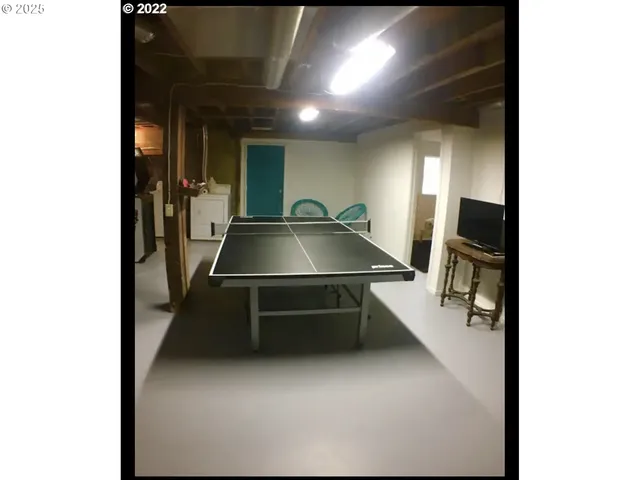 a room with stairs and furniture