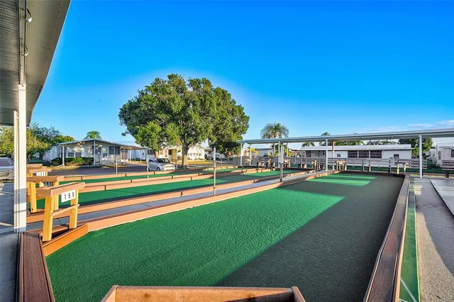 a view of swimming pool from a balcony