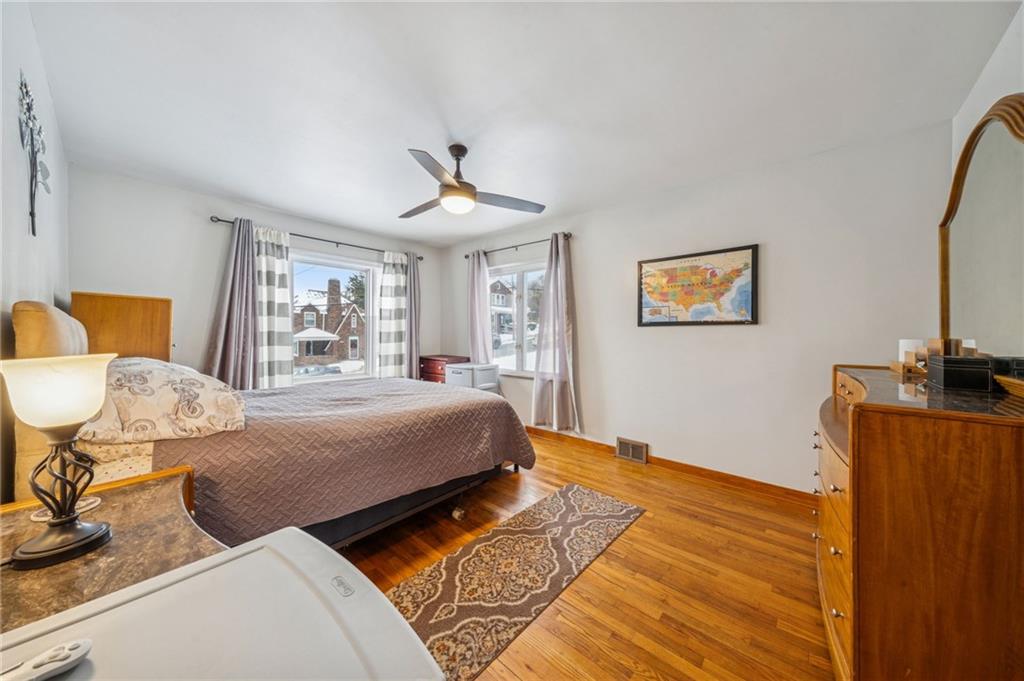 811 5th Street Trafford, PA 15085 - Photo 14 of 36 a bedroom with two beds and a table