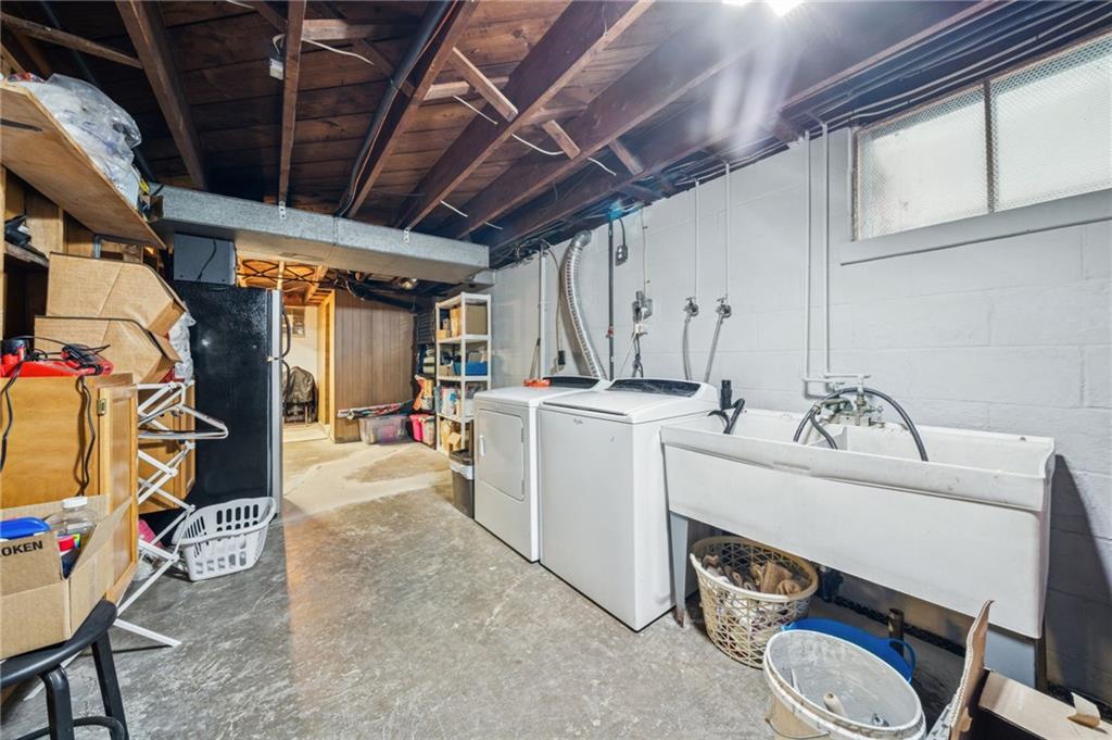 811 5th Street Trafford, PA 15085 - Photo 27 of 36 a utility room with dryer and washer