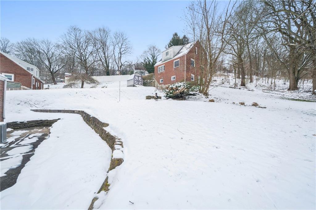 811 5th Street Trafford, PA 15085 - Photo 30 of 36 a view of snow on the side of road