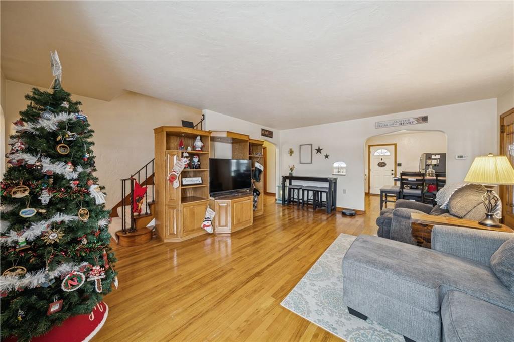 811 5th Street Trafford, PA 15085 - Photo 4 of 36 a living room with furniture and a flat screen tv