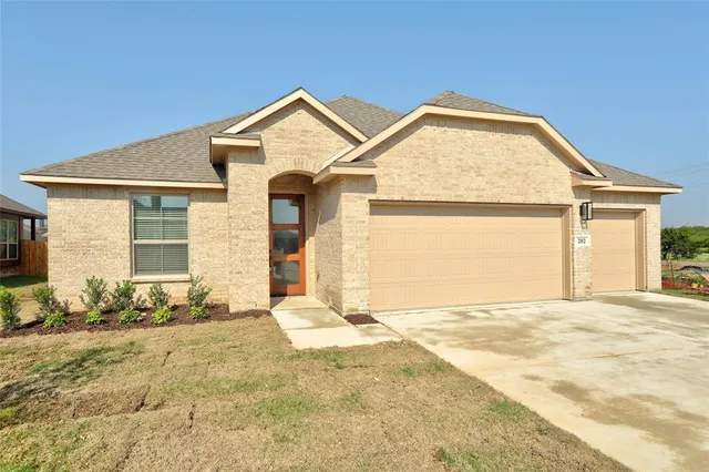 a view of a house with large windows