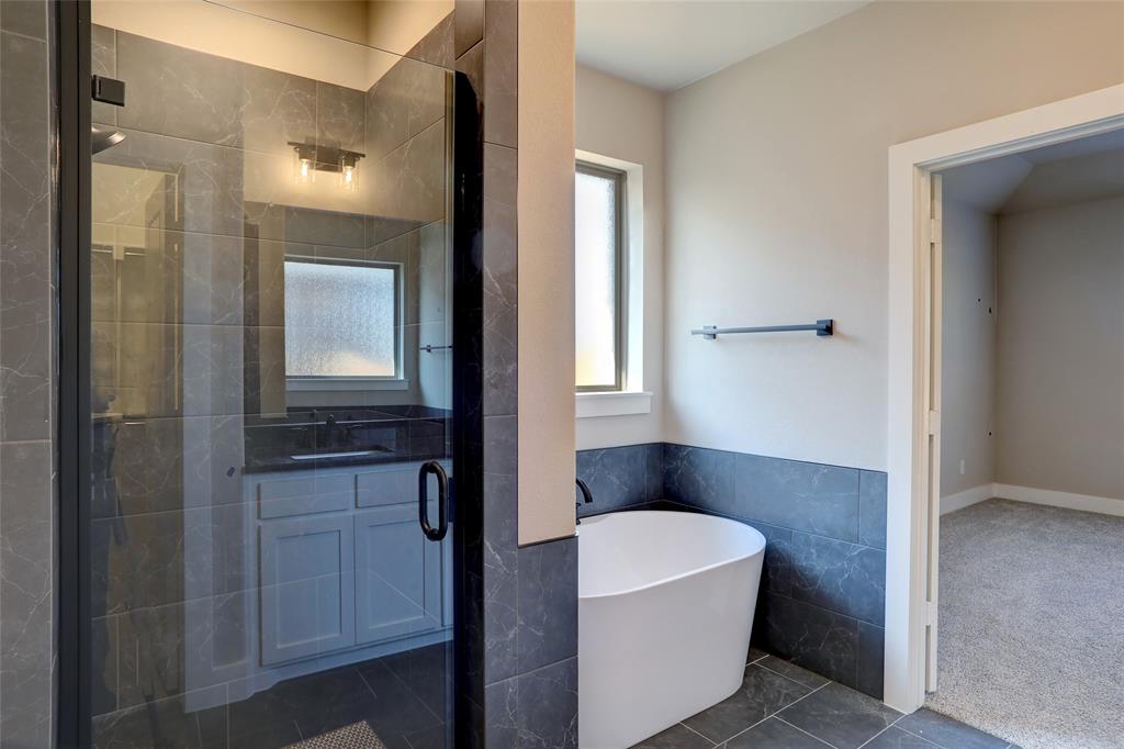 202 Pennington Road Josephine, TX 75173 - Photo 12 of 23 a bathroom with a bathtub and a sink