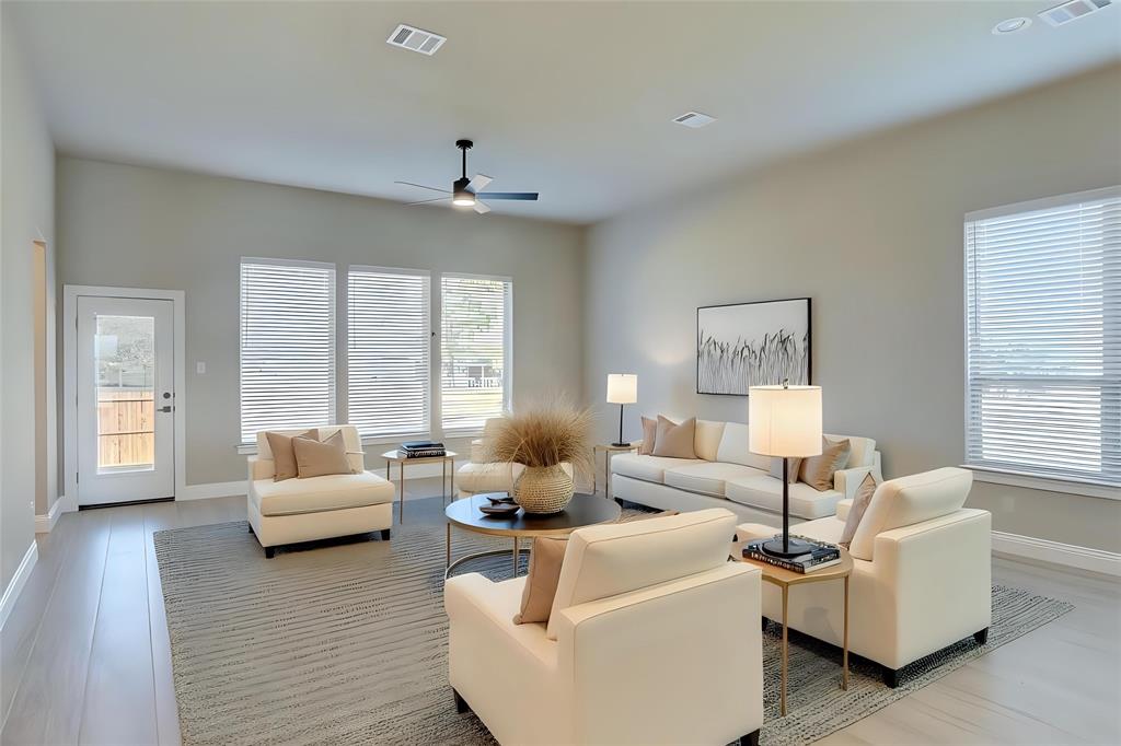 202 Pennington Road Josephine, TX 75173 - Photo 2 of 23 a living room with furniture and a large window