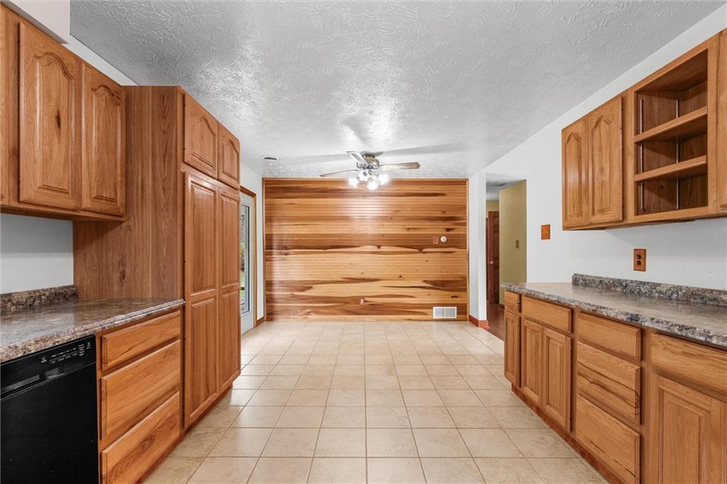 208 Republican Lane Indiana, PA 15701 - Photo 11 of 25 a kitchen with granite countertop a sink and cabinets