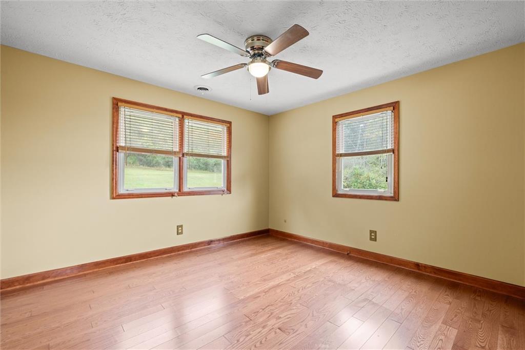 208 Republican Lane Indiana, PA 15701 - Photo 12 of 25 an empty room with window and ceiling fan