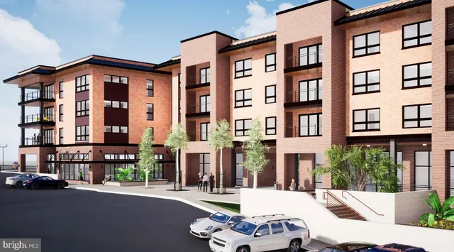 a table and chairs in front of a white house