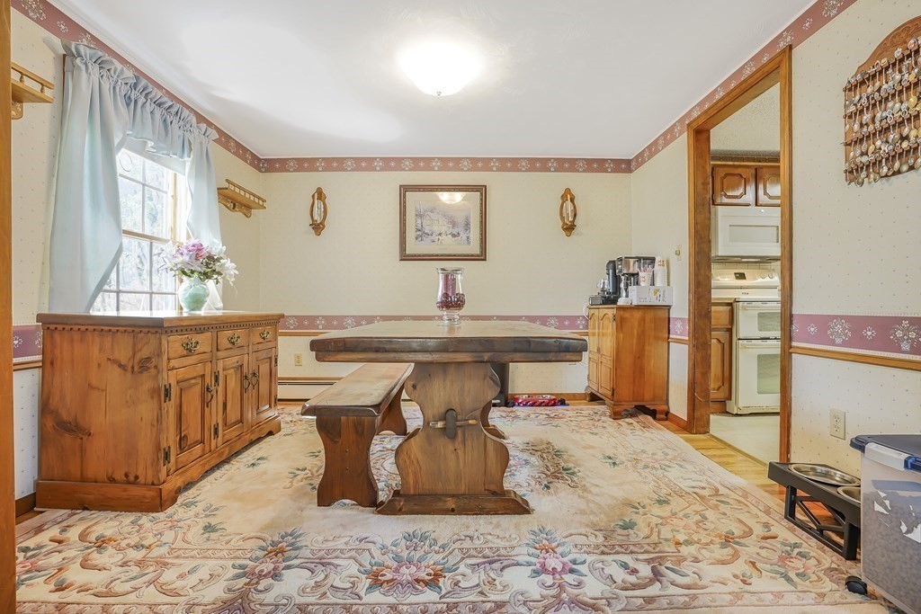 935 Almy Road Somerset, MA 02726 - Photo 14 of 37 a room with furniture window and a table