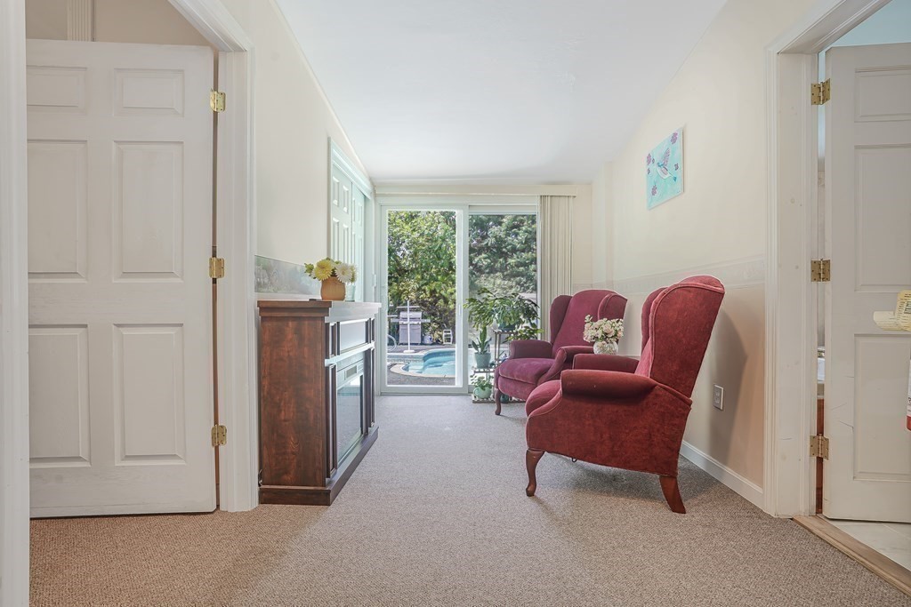 935 Almy Road Somerset, MA 02726 - Photo 20 of 37 a living room with furniture and a window