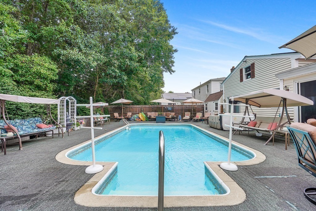 935 Almy Road Somerset, MA 02726 - Photo 7 of 37 a view of a swimming pool with lounge chairs