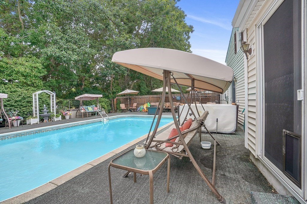 935 Almy Road Somerset, MA 02726 - Photo 8 of 37 swimming pool view with a seating space