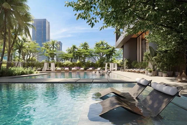 a view of a fountain in the yard of a house
