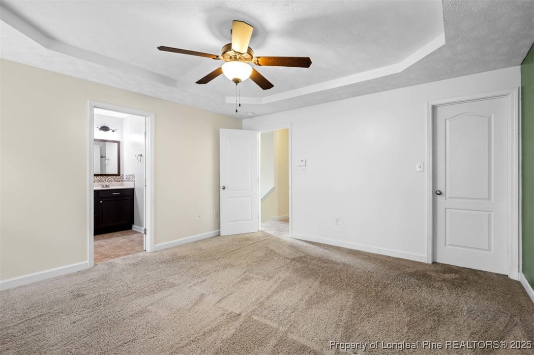 161 Bayleaf Drive Raeford, NC 28376 - Photo 19 of 33 a view of an empty room with a ceiling fan